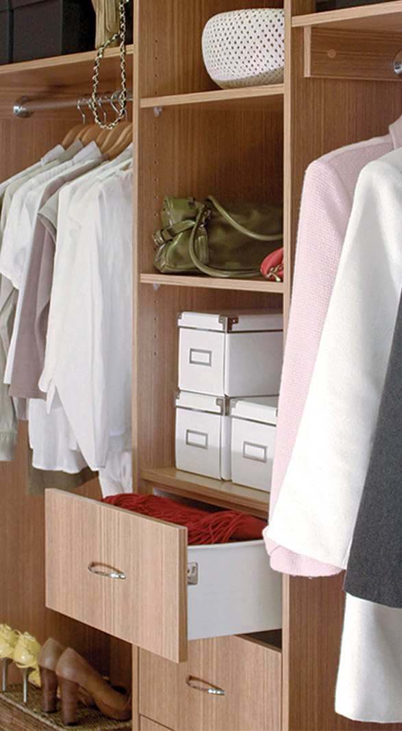 Walk in wardrobe with open drawer.